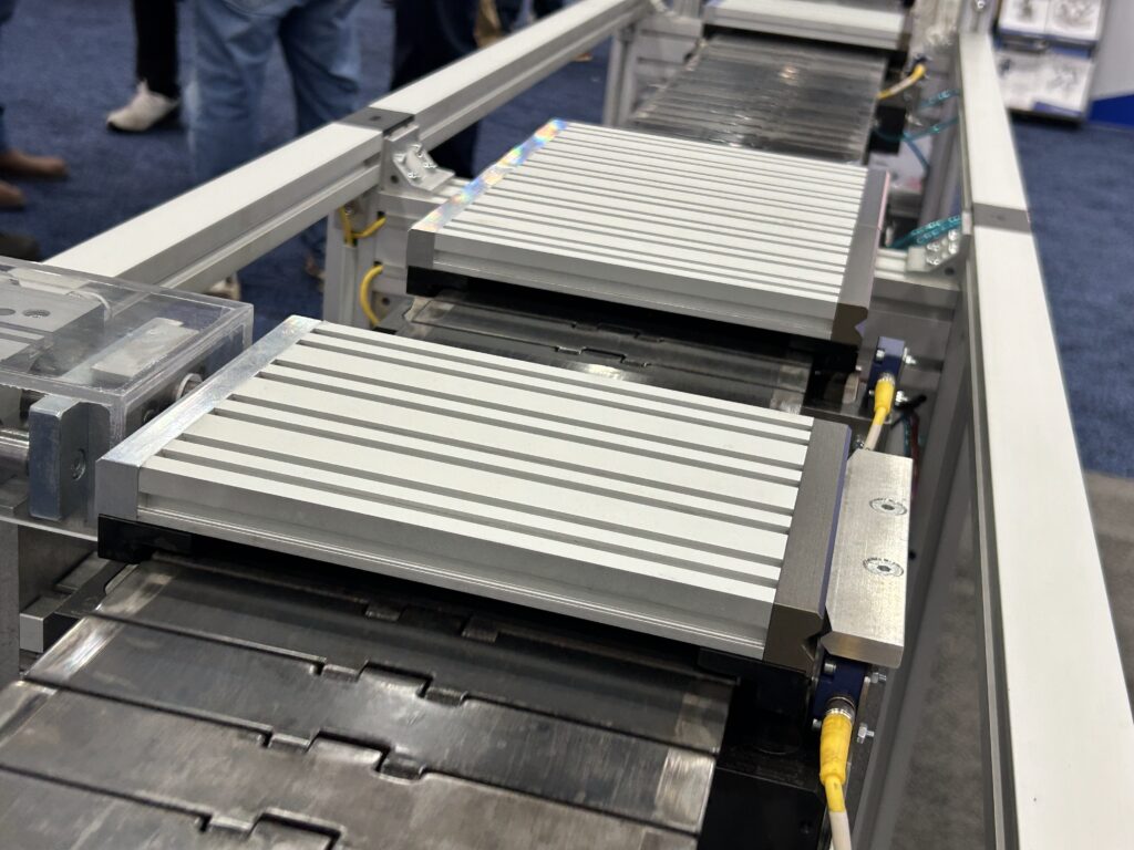mk North America’s recirculating pallet system works in any application where two machines need to be combined. The company says it’s available in two different chain widths and can reduce downtime in your facility.