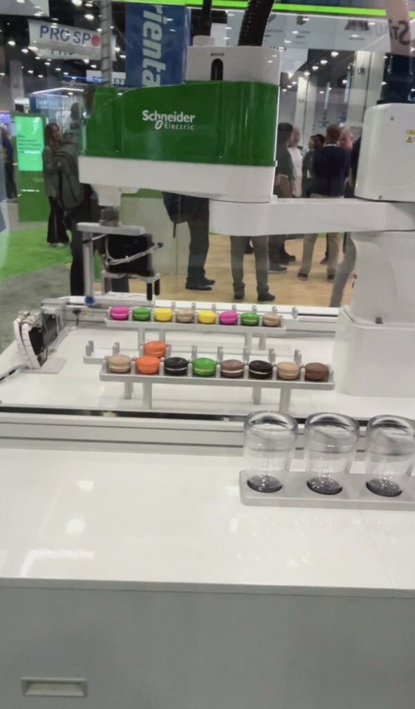 Schneider Electric demoed a robotic pick-and-place system at Automate, using macarons to show precision and repeatable handling for delicate products.
