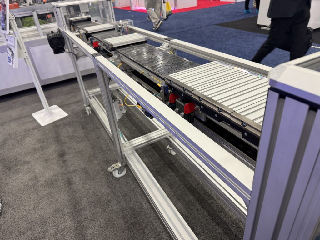 mk North America’s recirculating pallet system works in any application where two machines need to be combined. The company says it’s available in two different chain widths and can reduce downtime in your facility.
