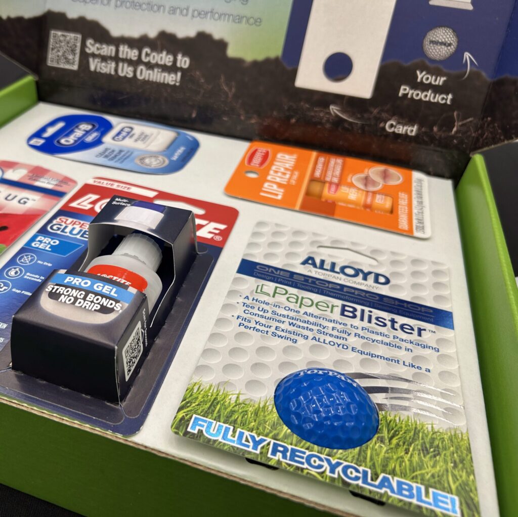 TOPPAN highlighted a variety of products made in blister packaging, including a golf ball that was packaged on its Aergo 8 machine. That package is fully recyclable and serves as an alternative to plastic packaging.