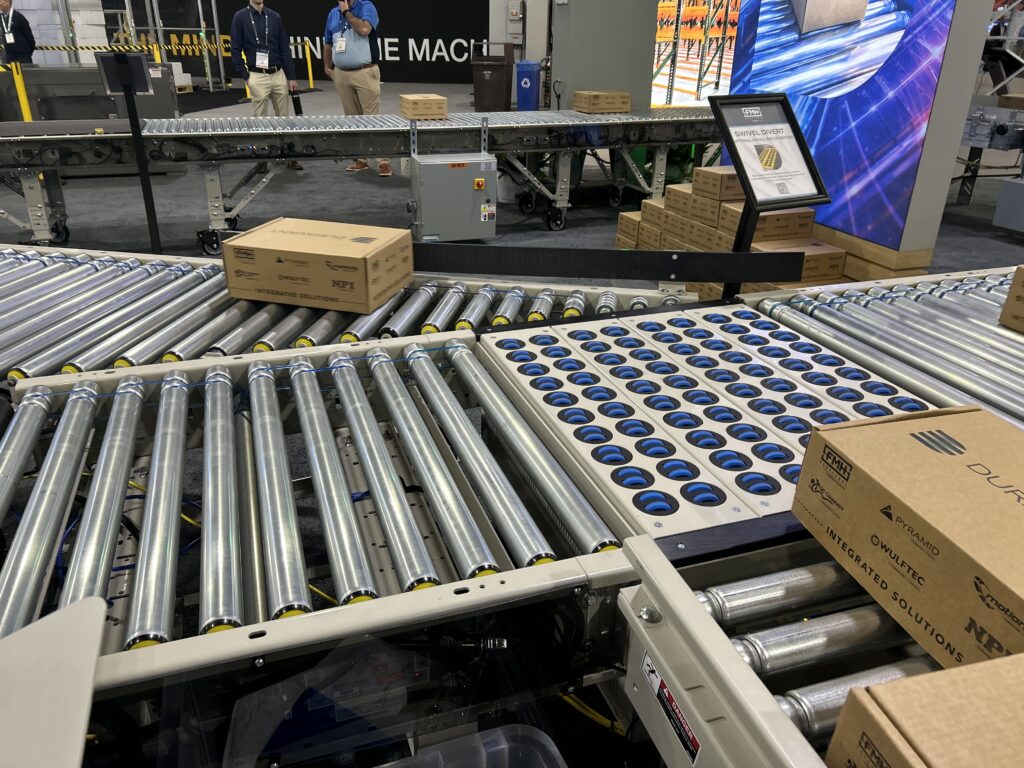 NPI, a Duravant company, demonstrated a swivel divert conveyor application at Modex 2026 in Atlanta, Georgia, showing a box being redirected for parcel and material handling sortation.