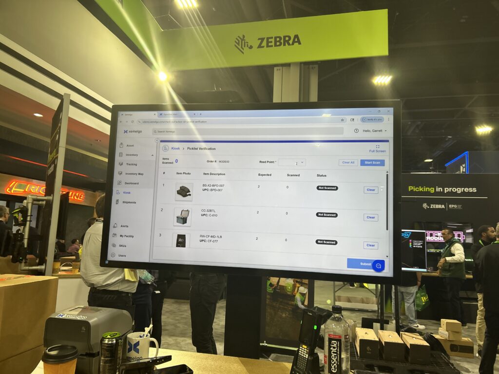 Xemelgo software at the Zebra Technologies booth at Modex 2026 in Atlanta, Georgia, demonstrating cloud-based shipment and logistics workflows using RFID technology.