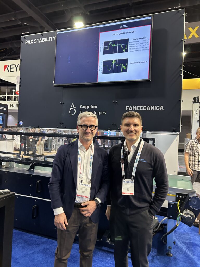 Angelini Technologies CEO Luigi De Vito and Gianluca Rossi, Head of Global Communication, at the Angelini Technologies booth during Modex 2026 in Atlanta, Georgia. The company announced at the show that Angelini Technologies advances next-generation logistics robotics solutions by acquiring stake in Lab0, Inc.