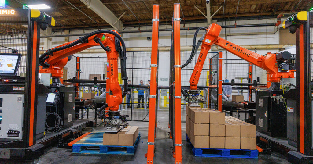 Kuka robotic palletizing cells at Wyandot Snacks handling end-of-line case packing for cereal and tortilla chip production, supporting increased throughput and reduced manual handling across the packaging line