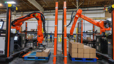 Kuka robotic palletizing cells at Wyandot Snacks handling end-of-line case packing for cereal and tortilla chip production, supporting increased throughput and reduced manual handling across the packaging line