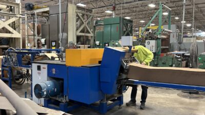 An operator checks a machine at Ranpak's facility in Concord Township, Ohio. The company provides sustainable packaging systems and works with end users such as Walmart and Amazon. Photo taken on February 3, 2026.