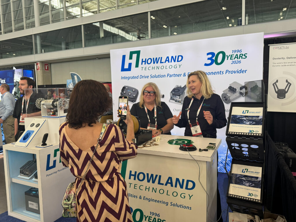Sheri Kasprzak, executive editor of Control Engineering and Plant Engineering, interviews Stephania Holland, president of Howland Technology, and Carolina Kelly, sales engineer at Howland Technology, on the show floor at the Robotics Summit & Expo.