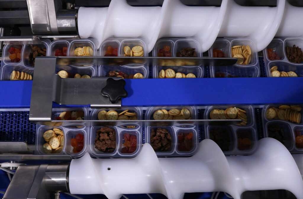 Timing screws from Morrison Container Handling Solutions help guide containers through packaging equipment.