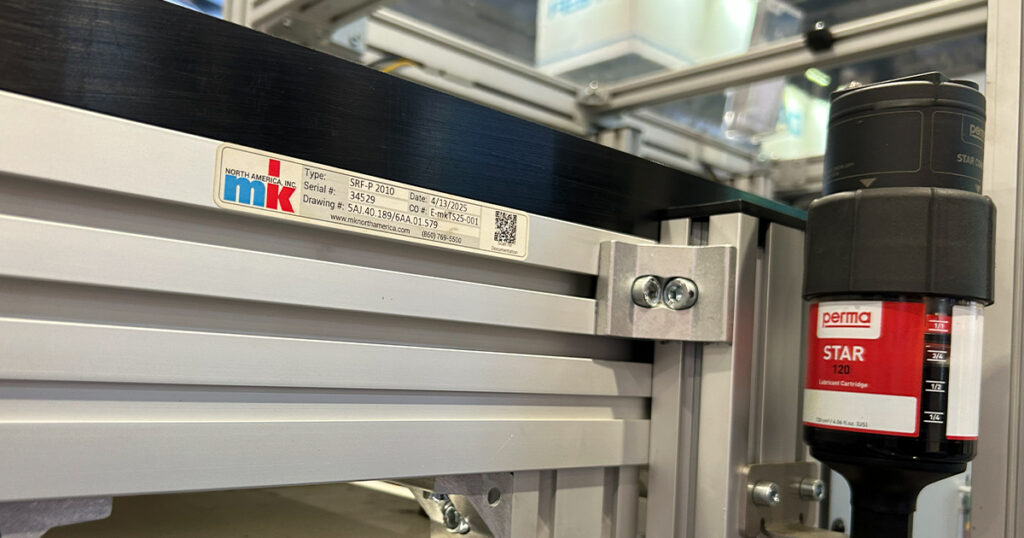 mk North America QR code label on a conveyor provides access to the conveyor manual, recommended spare parts, approval drawings, and equipment-specific information.