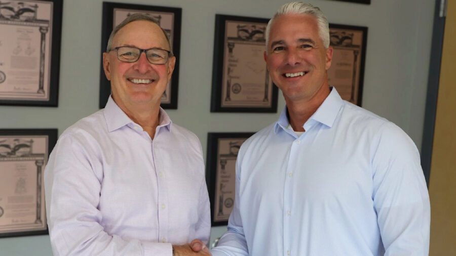 Craig Souser (left), who retired Oct. 12 after nearly five decades leading JLS Automation, and Russ Stroner (right), the company’s new President and CEO. JLS Automation manufactures hygienic robotic packaging systems.